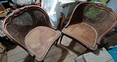 Poltroncine in legno foderate in paglia di Vienna 