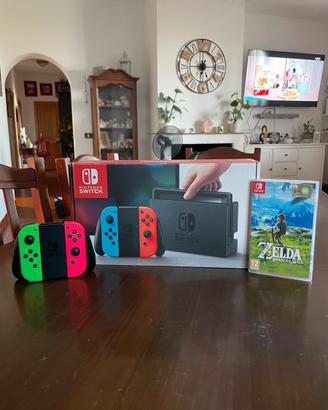 NINTENDO SWITCH COMPLETA + controller + gioco