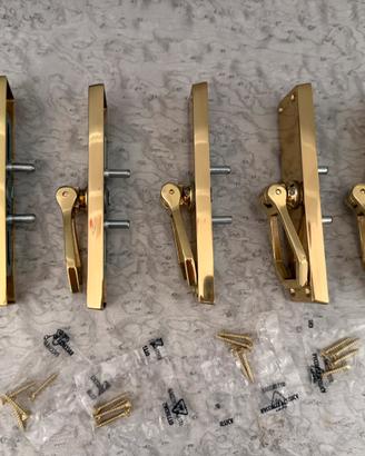 Maniglie  per infissi in legno in ottone lucido