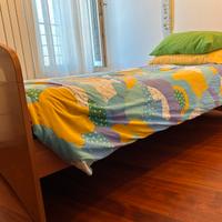 Letto con secondo letto a cassettone.