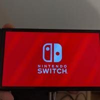 Nintendo switch oled nera + custodia 