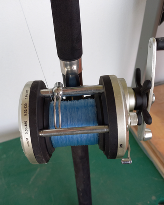 Canna mulinello e artificiali per trainetta