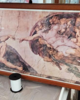 Quadro grande con stampa e cornice in legno.