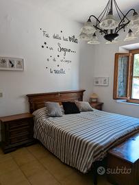 Casa con giardino