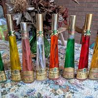 8 bottiglie con liquore cristallizzato Casoni.