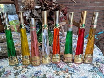 8 bottiglie con liquore cristallizzato Casoni.