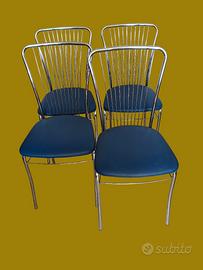 quattro sedie  in metallo  cromato 