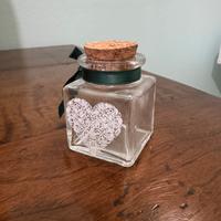 Barattolo di vetro decorato con tappo di sughero