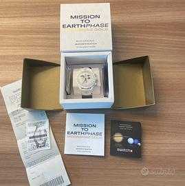 Omega moonswatch earthphase moonshine gold