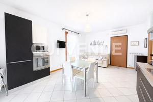 Trilocale con ampio giardino privato e piscina