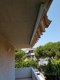 Tenda parasole caduta verticale.