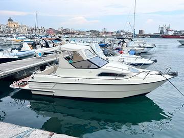 Barca selaine motore e carello