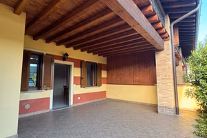 Trilocale P.terra con garage, posto auto e giardin