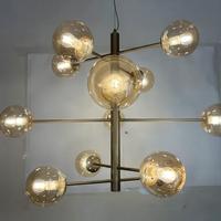 Lampadario metallo oro/vetro sfera ambra