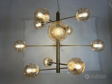 Lampadario metallo oro/vetro sfera ambra