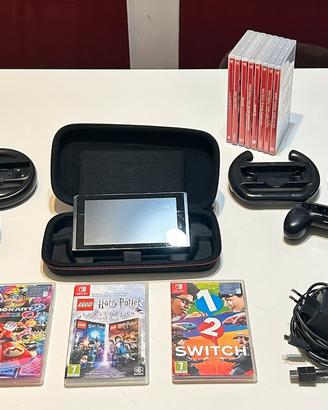 Nintendo switch con accessori e giochi