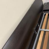 Letto matrimoniale e comodini