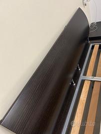 Letto matrimoniale e comodini