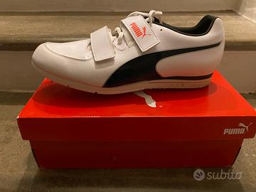 Scarpe chiodate salto triplo