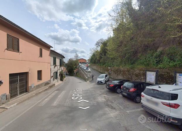 Riano quadrilocale con giardino e posto auto