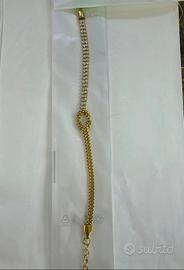 Bracciale dorato con nodo inossidabile
