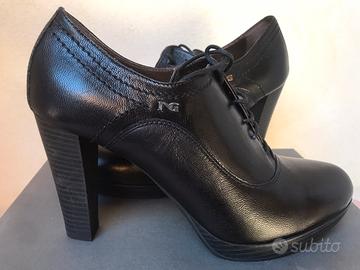 Francesina stringata donna in pelle con logo a vis