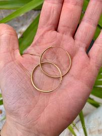 Orecchini a cerchio in argento dorato