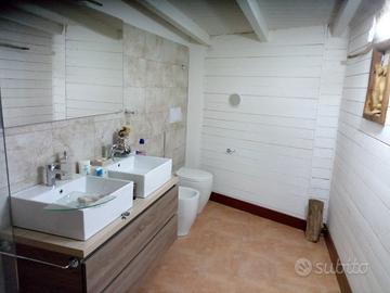 Camere con bagno e cucina