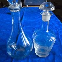 Coppia di bottiglie di vetro