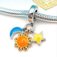 Charm argento 925 fluorescente sole luna stella