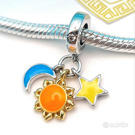 Charm argento 925 fluorescente sole luna stella