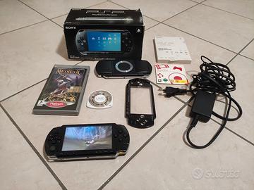 PSP 1004 FUNZIONANTE + 2 GIOCHI