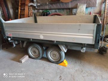 Rimorchio ribaltabile trilaterale