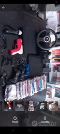 ps3 slim con giochi, volante  e accessori