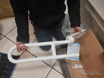 Barra ribaltabile per bagno disabili 