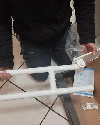 Barra ribaltabile per bagno disabili 
