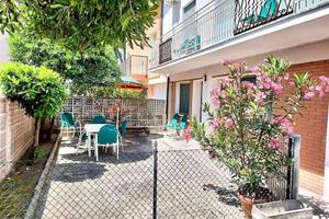 Trilocale Climatizzato con Giardino e Posto auto