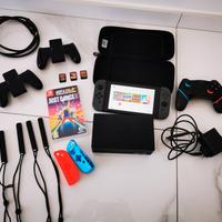 Nintendo Switch + 4 giochi + accessori