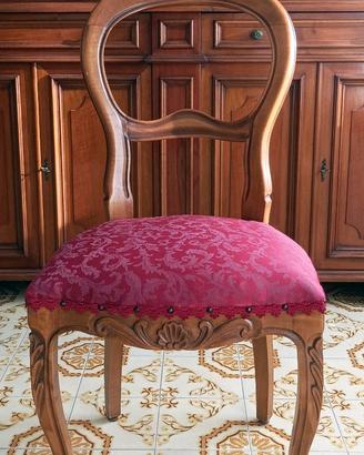 Sedie in legno intagliate