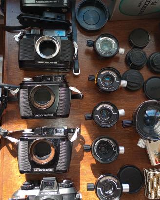 Fotocamere Nikonos + obiettivi+flash+accessori