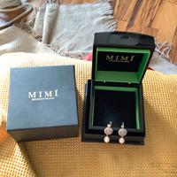 Orecchini in oro bianco e perle