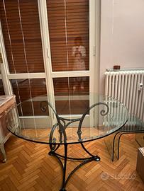 Tavolo rotondo in cristallo con base in ferro