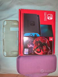 Nintendo Switch + custodie + Bayonetta 3