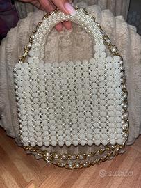 Borsa a mano con perle beghe