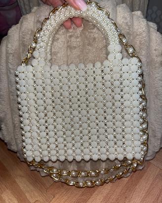Borsa a mano con perle beghe