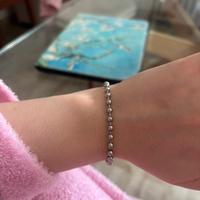 Braccialetto perline argentate