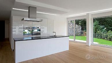 APPARTAMENTO AL PIANO TERRA CON GIARDINO