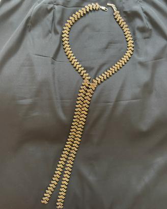 Collana brillante dorata a cravatta