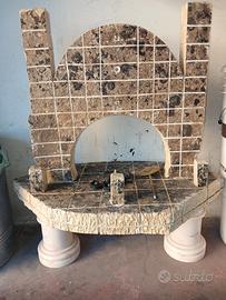 Scultura in pietra anticata