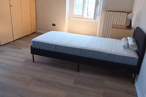 Stanza singola/posto letto in doppia